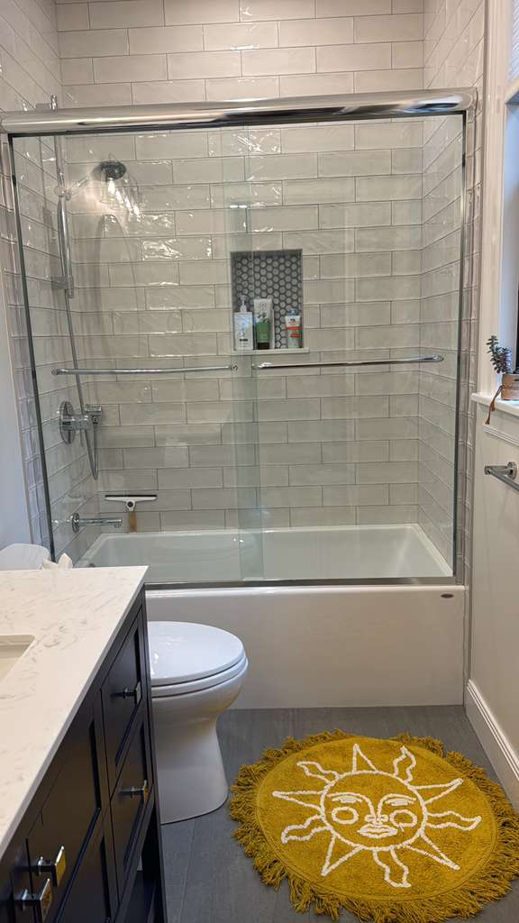 Spotless clean bathroom with glass shower